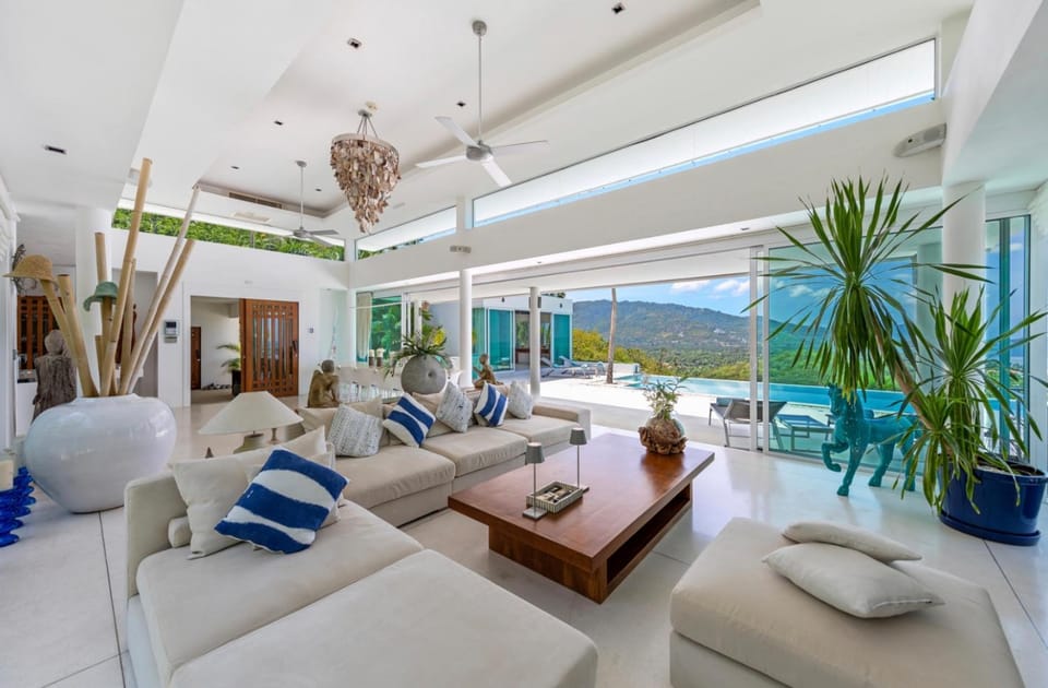 Natural landscape, Living room, Seating area, Mountain view, Pool view, Swimming pool, fireplace, sunbed, air conditioner