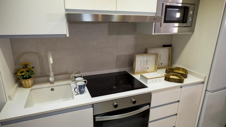 Kitchen or kitchenette, stove