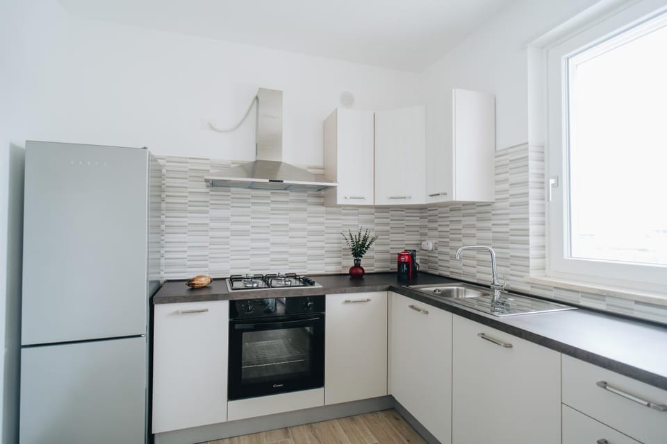 Kitchen or kitchenette, oven, stove