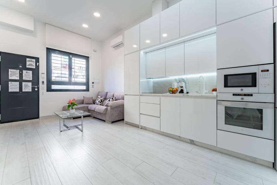 Kitchen or kitchenette, Living room, microwave, oven, stove