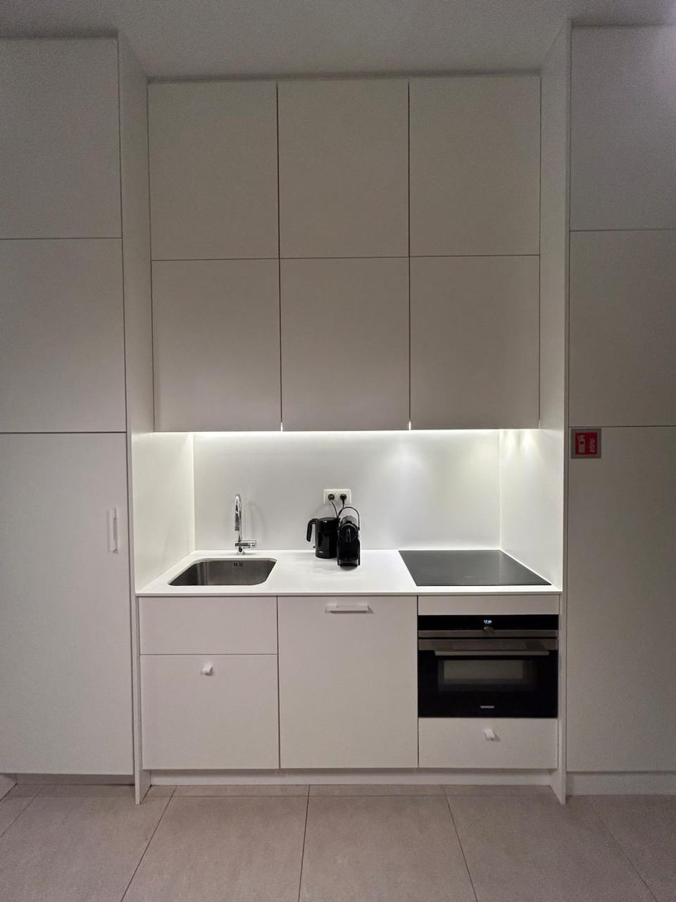 Kitchen or kitchenette, microwave, oven, stove