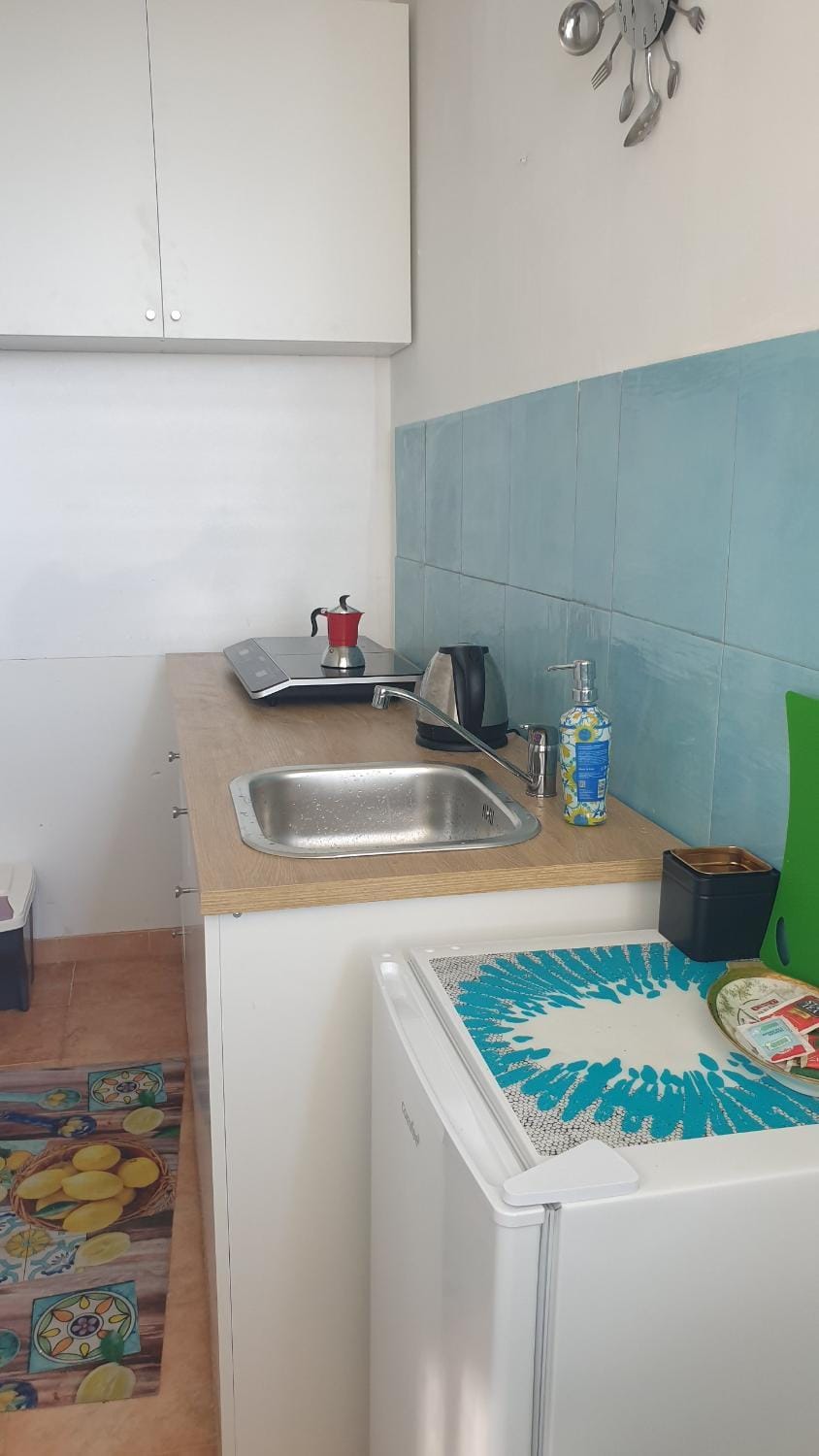 Kitchen or kitchenette, stove