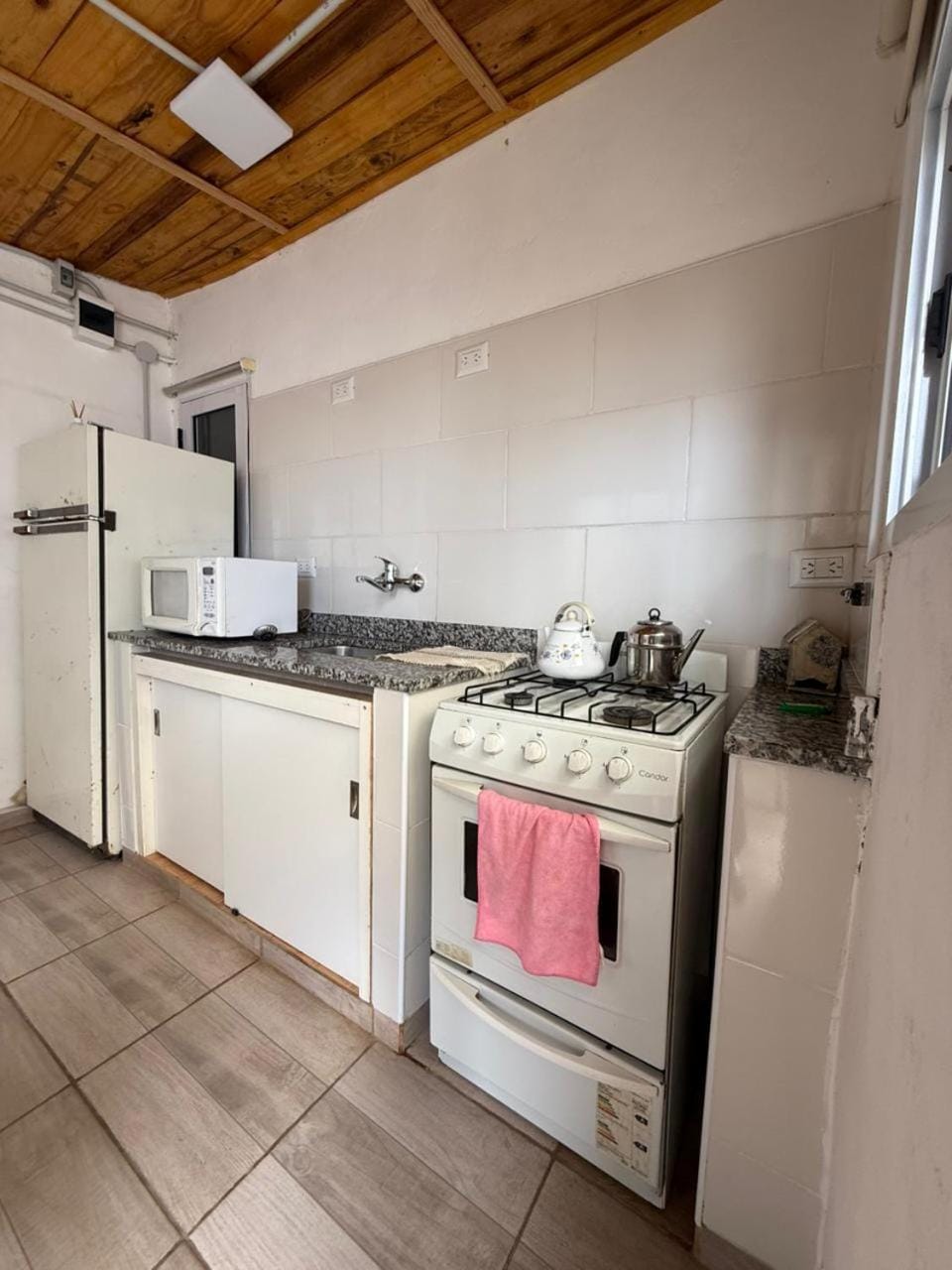 Kitchen or kitchenette, oven, stove