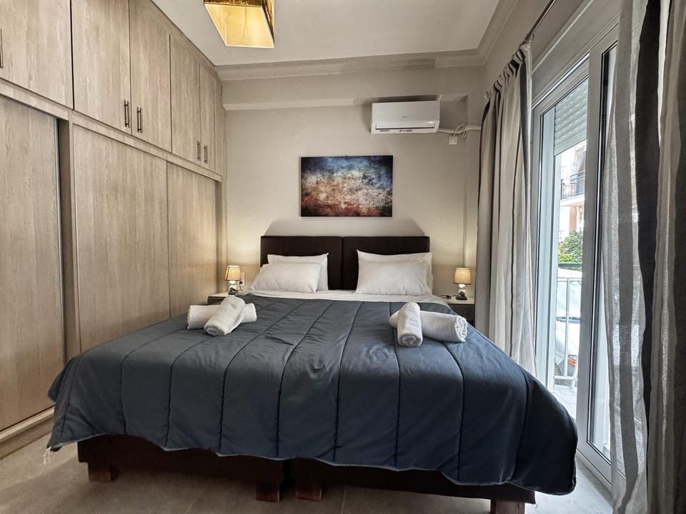 Bed, Bedroom, towels, wardrobe, air conditioner