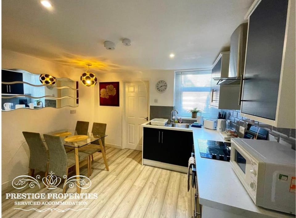 Kitchen or kitchenette, Dining area, oven, stove, toaster