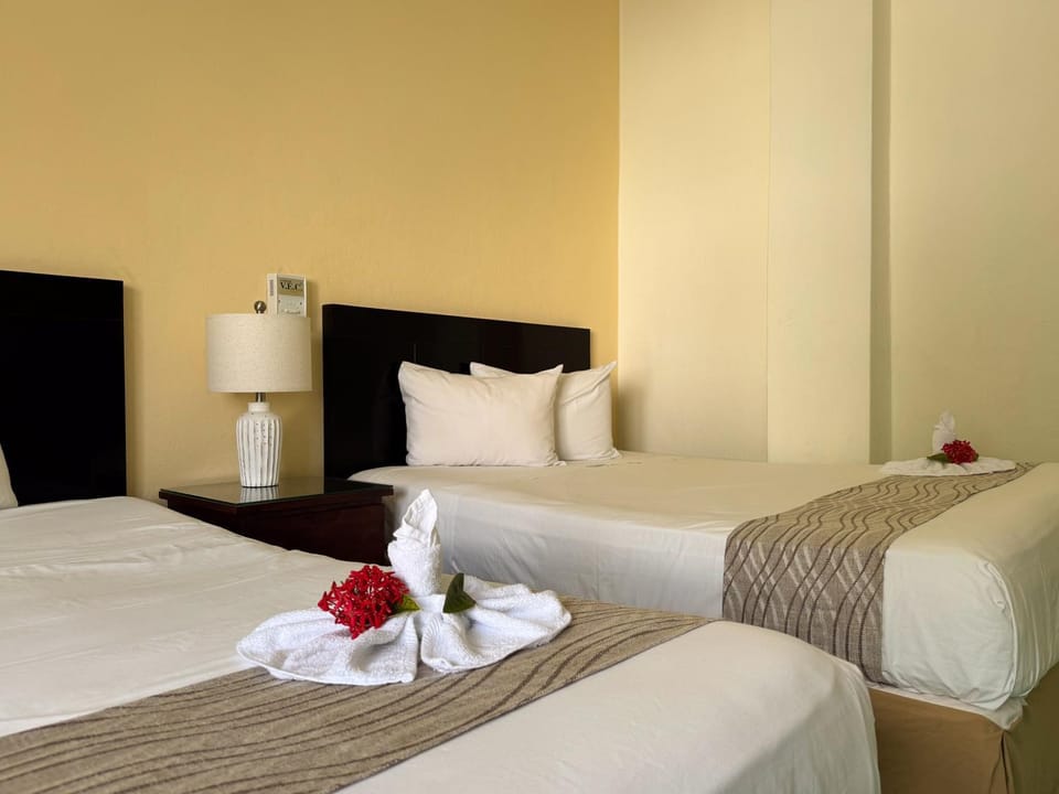 Bed, Decorative detail, Decorative detail, towels