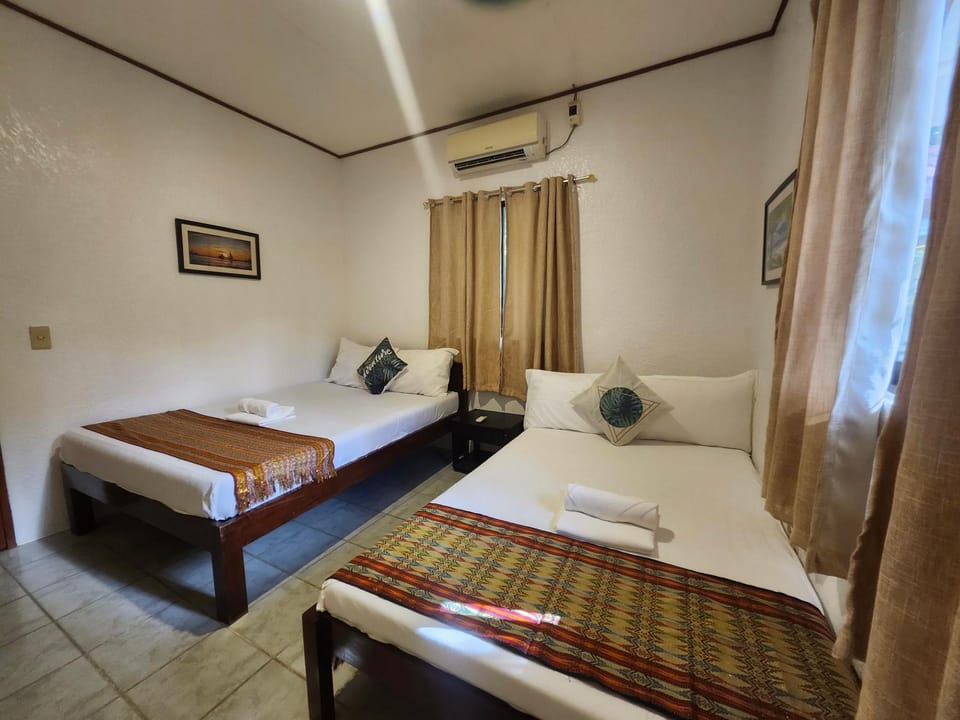 Property building, Bed, Photo of the whole room, Bedroom, towels, air conditioner