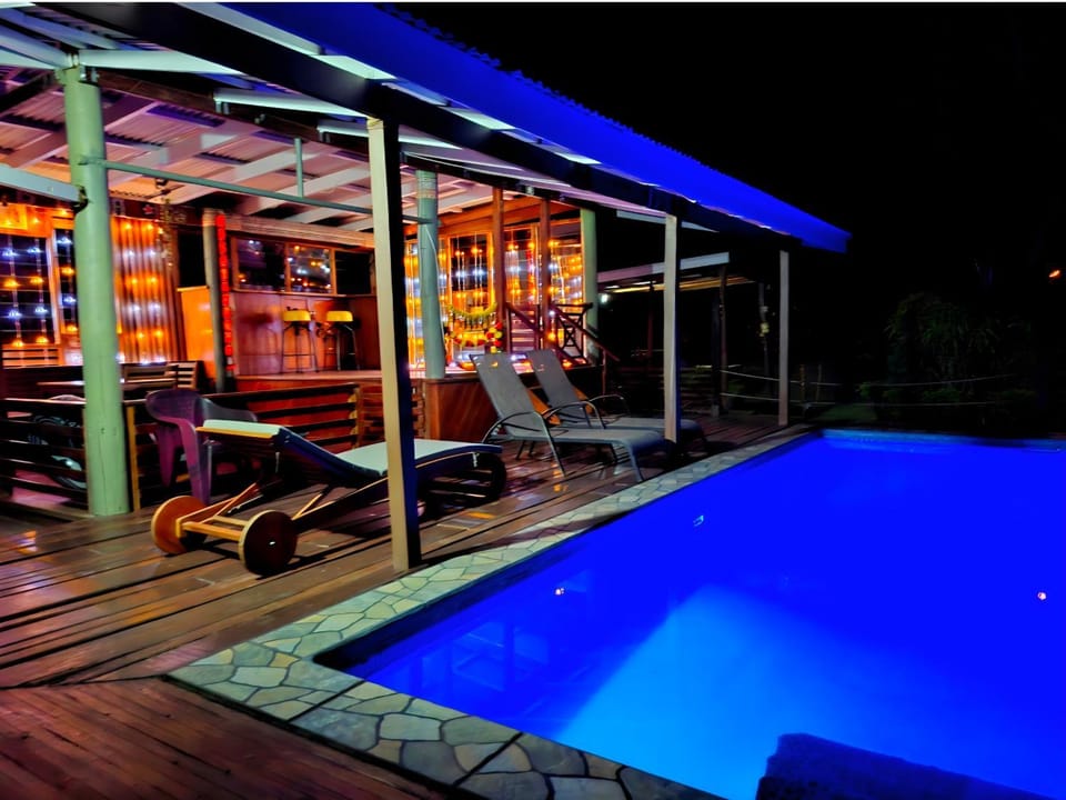 Night, Pool view, Swimming pool, sunbed