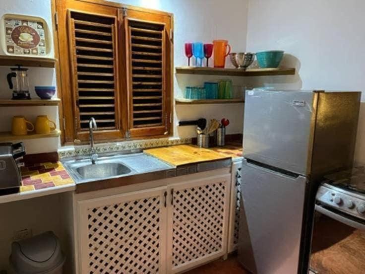 Kitchen or kitchenette, oven, stove