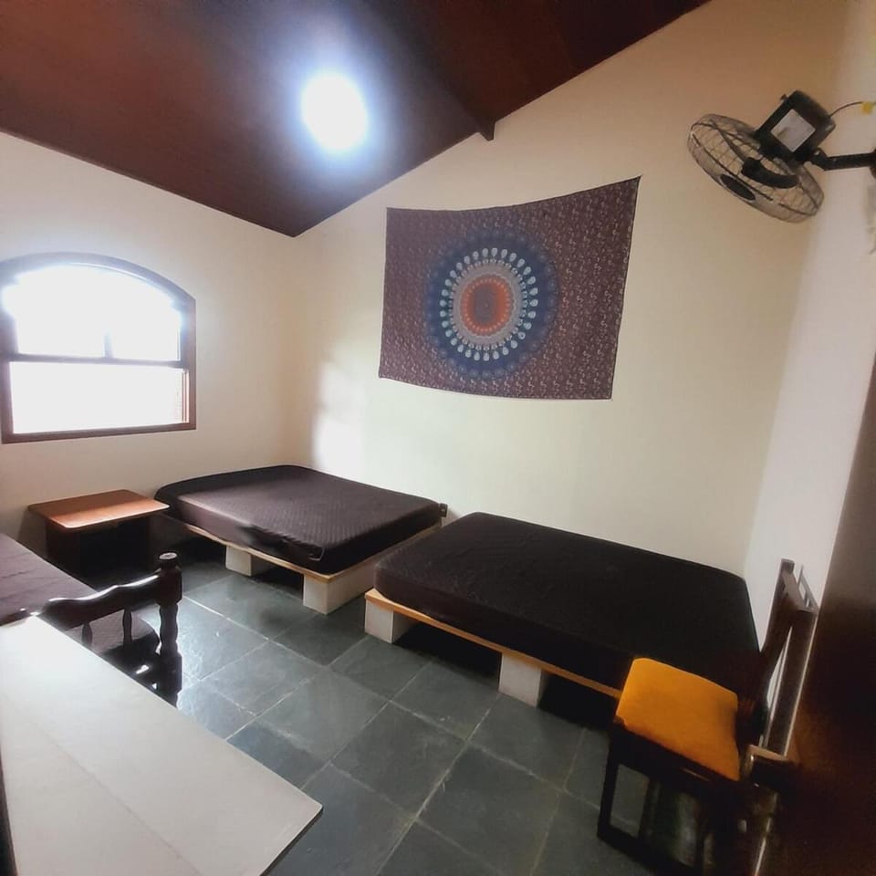 Casa com piscina e churrasqueira a 100 metros da praia House in São Sebastião