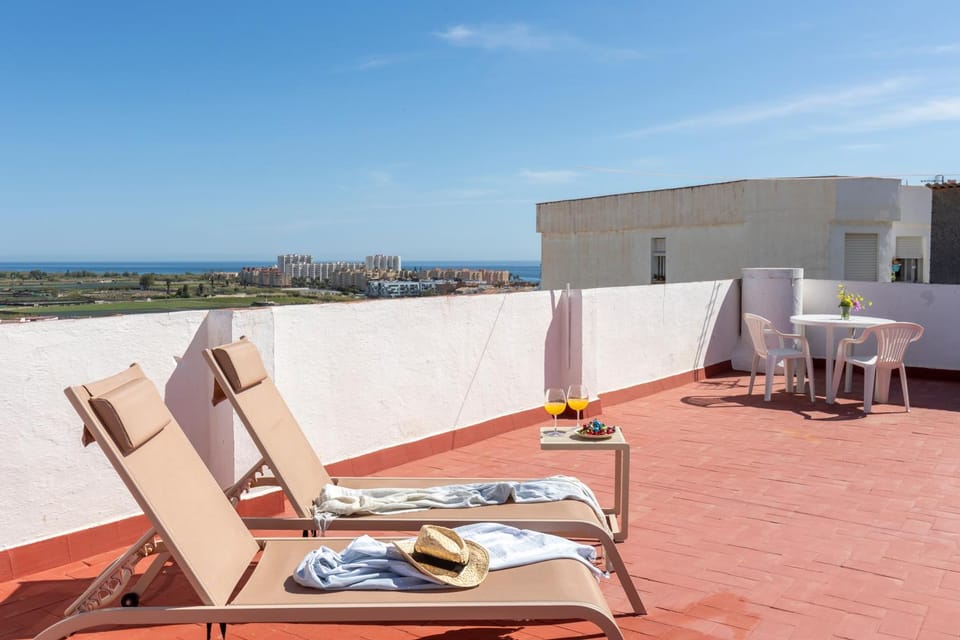 View (from property/room), Living room, Seating area, Sea view, sunbed