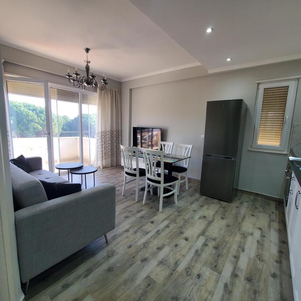 Kitchen or kitchenette, Living room, Seating area, Dining area