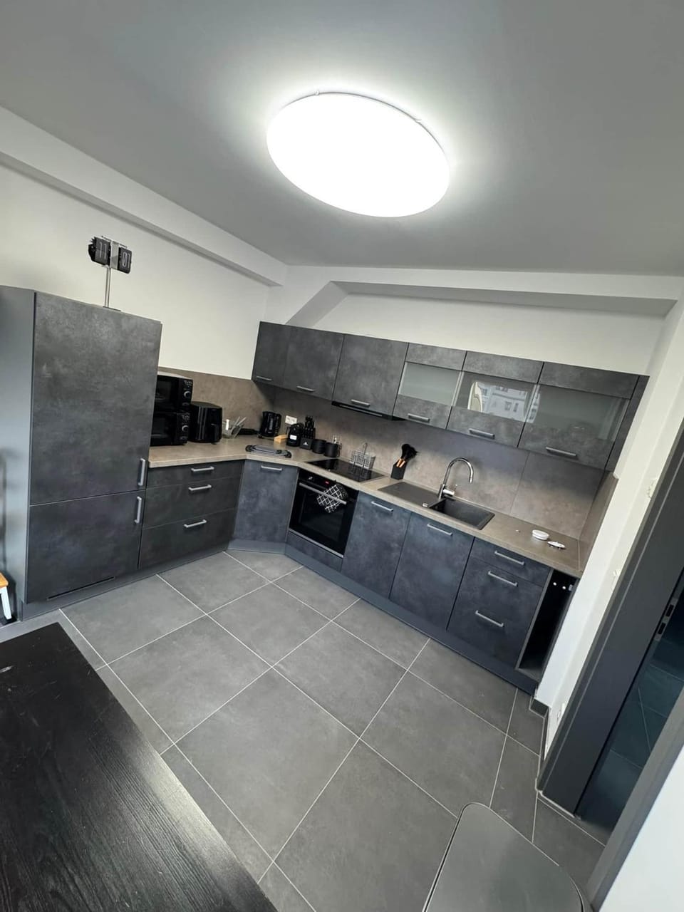 Kitchen or kitchenette, dishwasher, stove, kitchen