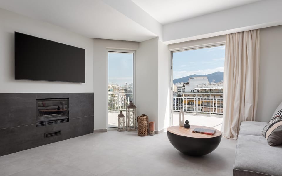 TV and multimedia, Living room, Seating area, Mountain view, fireplace