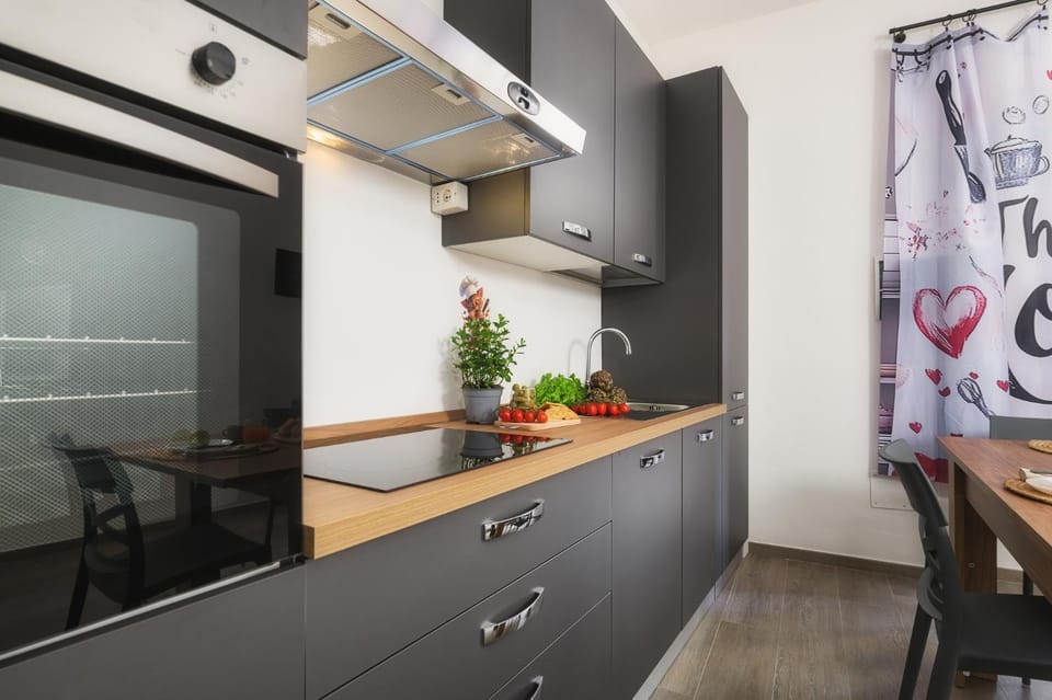 Kitchen or kitchenette, oven, stove