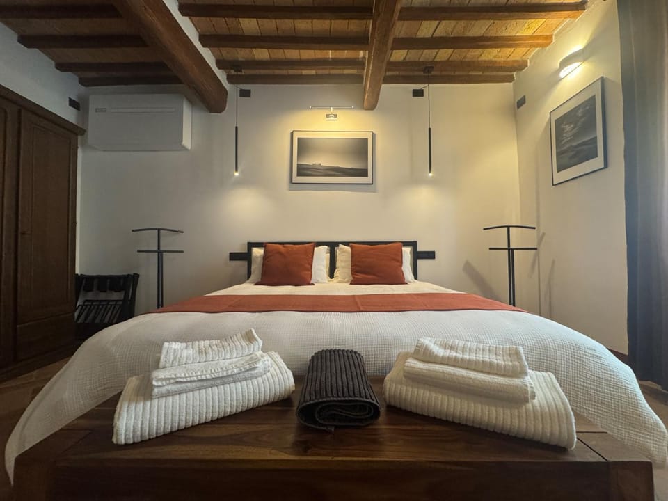Bed, Photo of the whole room, Bedroom, towels, air conditioner