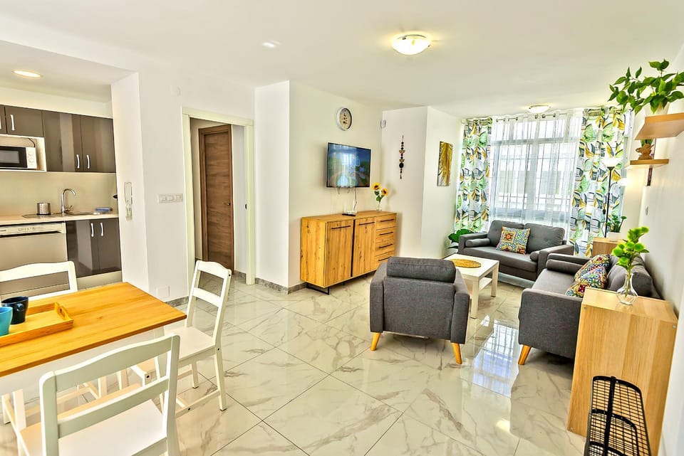 TV and multimedia, Kitchen or kitchenette, Living room, Seating area, Dining area, dishwasher, oven, air conditioner