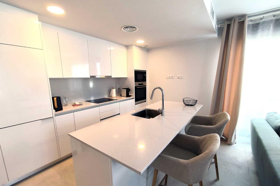 Kitchen or kitchenette, oven, stove, toaster