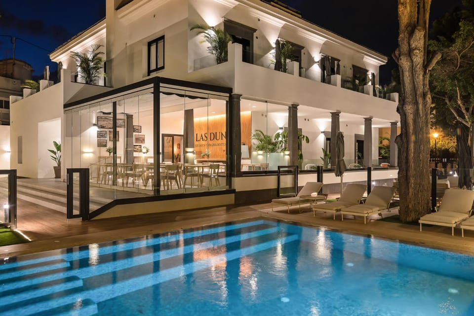 Property building, Night, Garden, Dining area, Garden view, Pool view, Swimming pool
