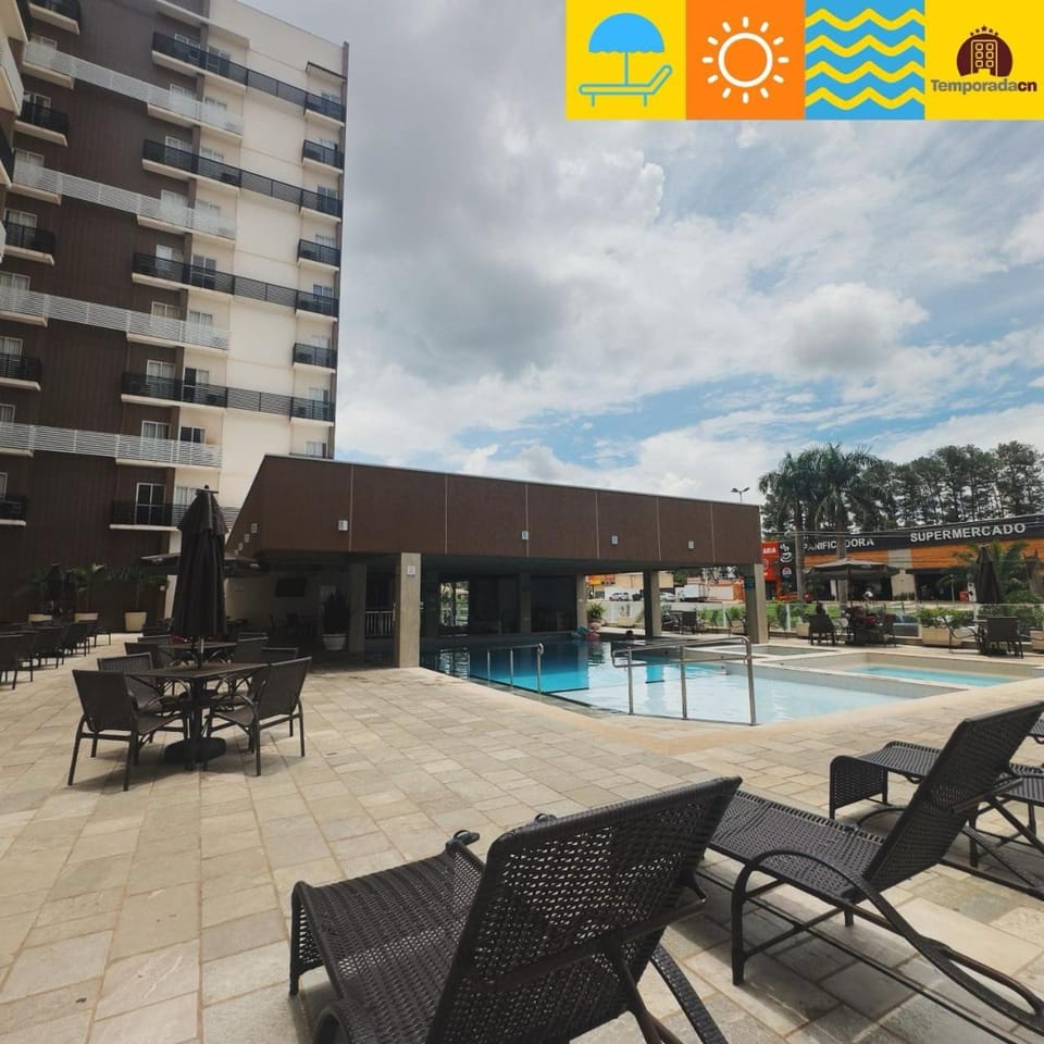 Property building, Patio, Communal lounge/ TV room, Day, Evening entertainment, Pool view, Swimming pool, sunbed