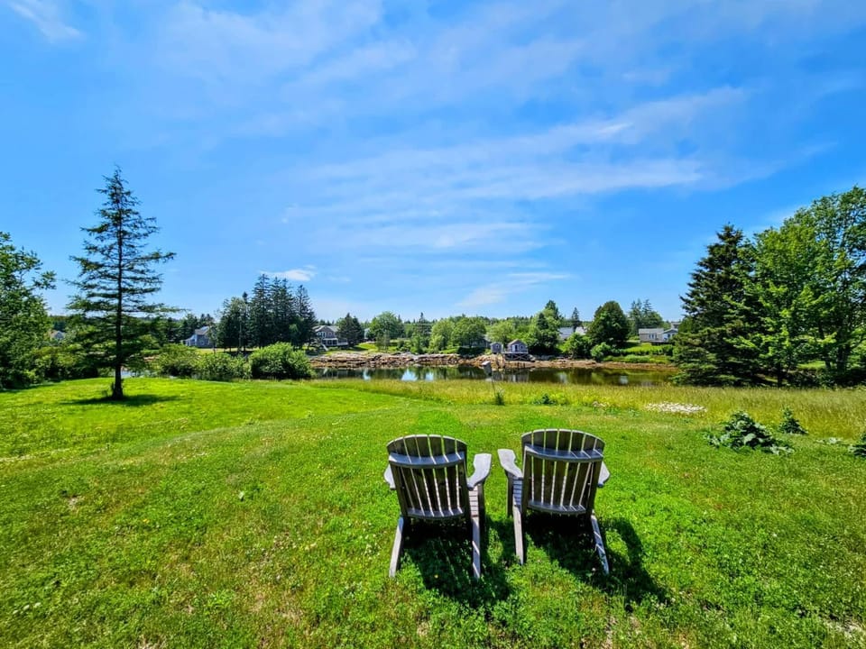 Waterfall Sea Cottage Family fire pit waterfront sleeps 4 House in Prospect Harbor