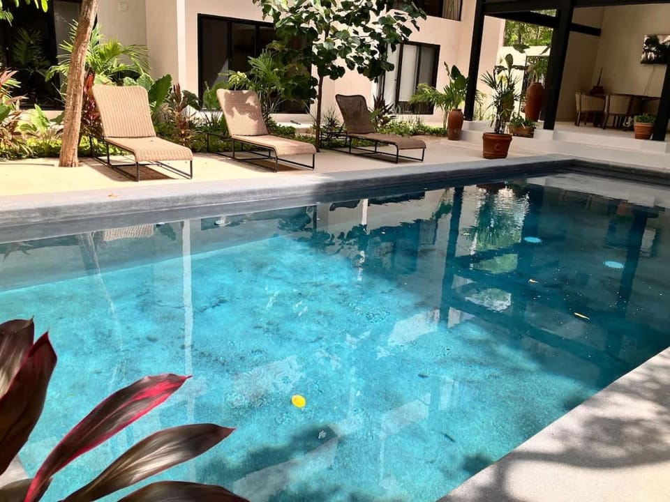 Tulum groups home for 8 guest with 2 bedrooms Balcony Common Pool Gym Yoga and mini Market Ximbal House in Tulum