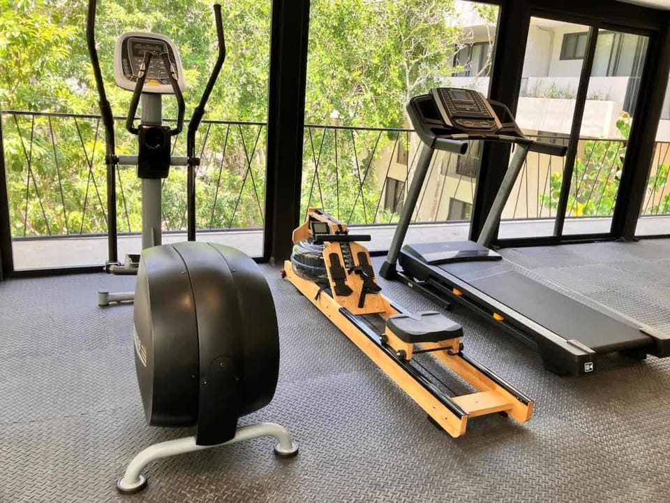 Tulum groups home for 8 guest with 2 bedrooms Balcony Common Pool Gym Yoga and mini Market Ximbal House in Tulum