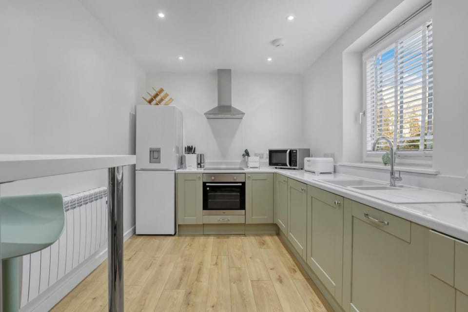 Kitchen or kitchenette, oven, stove, toaster
