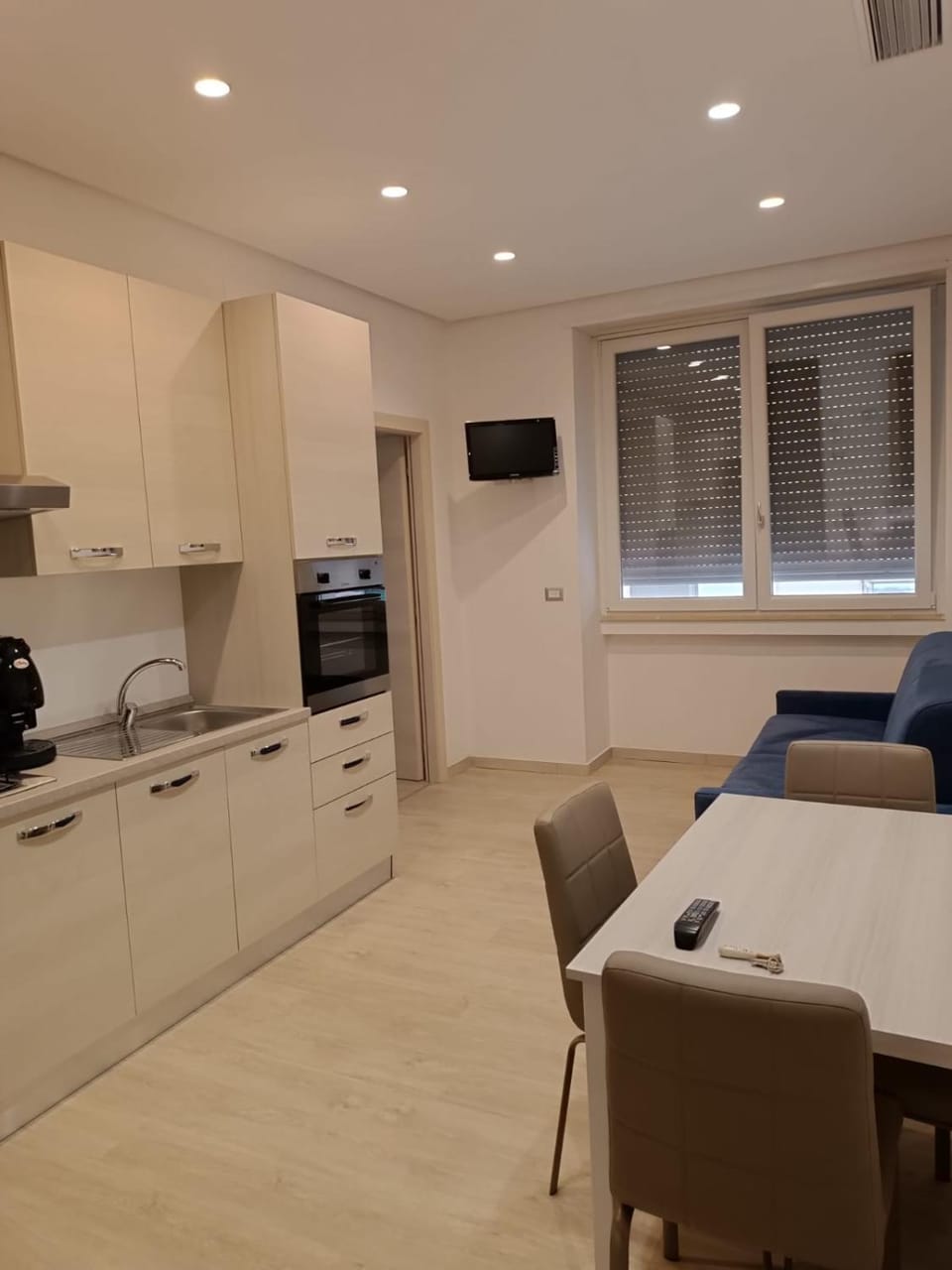 Dining area, minibar, oven, stove