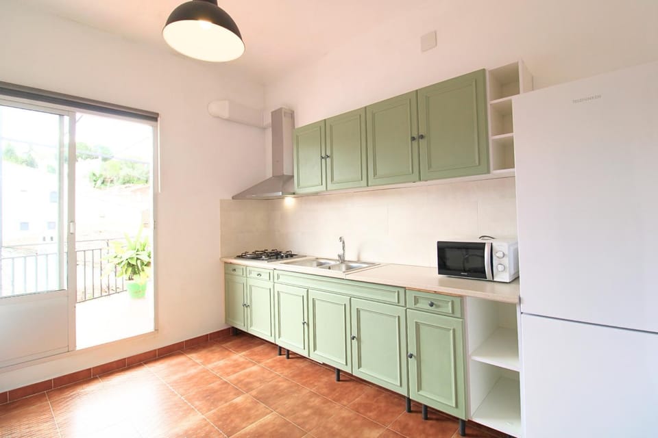 Kitchen or kitchenette, stove