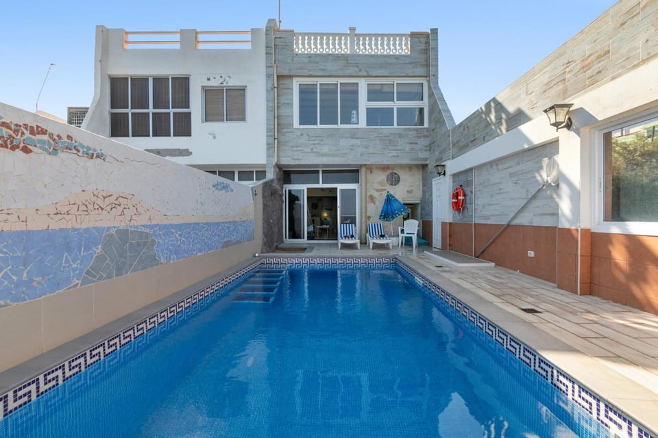 Property building, Living room, Swimming pool