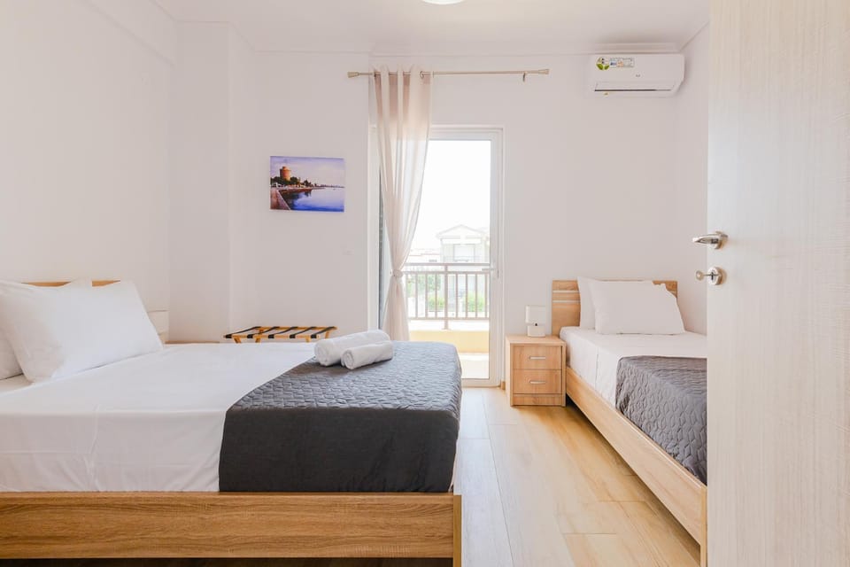 Bed, Photo of the whole room, Bedroom, towels, air conditioner