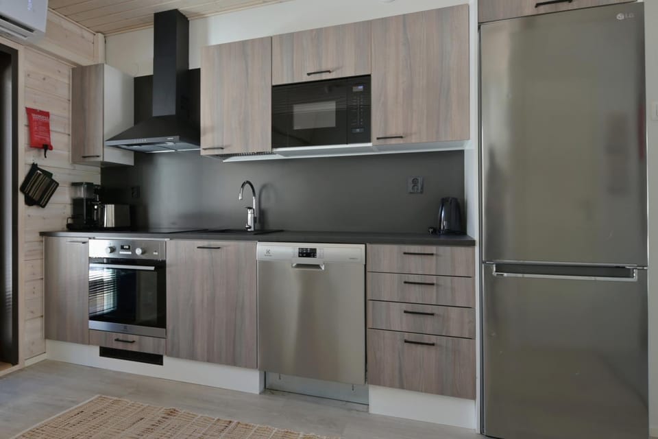 Kitchen or kitchenette, dishwasher, oven, stove, toaster