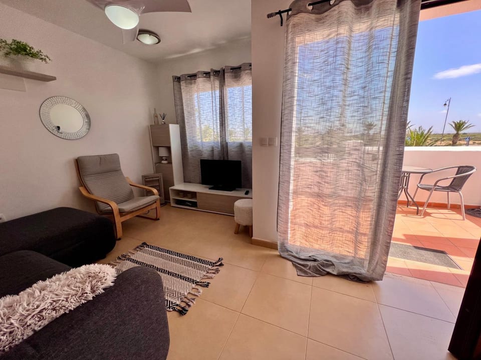 Communal lounge/ TV room, TV and multimedia, Living room, Seating area, air conditioner