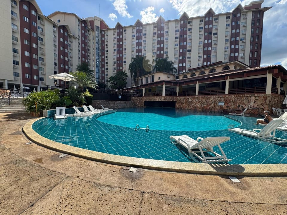 Property building, Day, Pool view, Swimming pool, sunbed