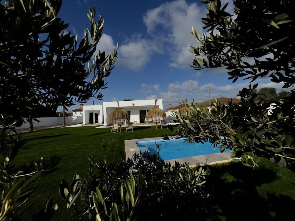 Property building, Living room, Swimming pool