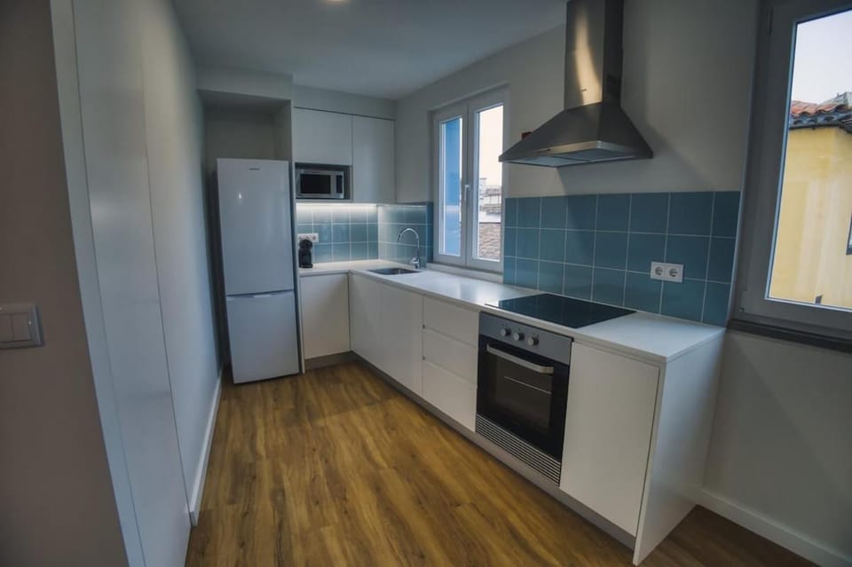 Kitchen or kitchenette, oven, stove