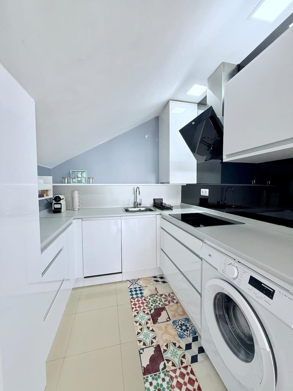 Kitchen or kitchenette, dishwasher, stove, washing machine
