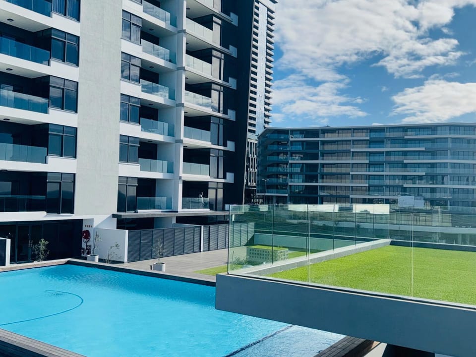 Property building, Pool view, Swimming pool, sunbed