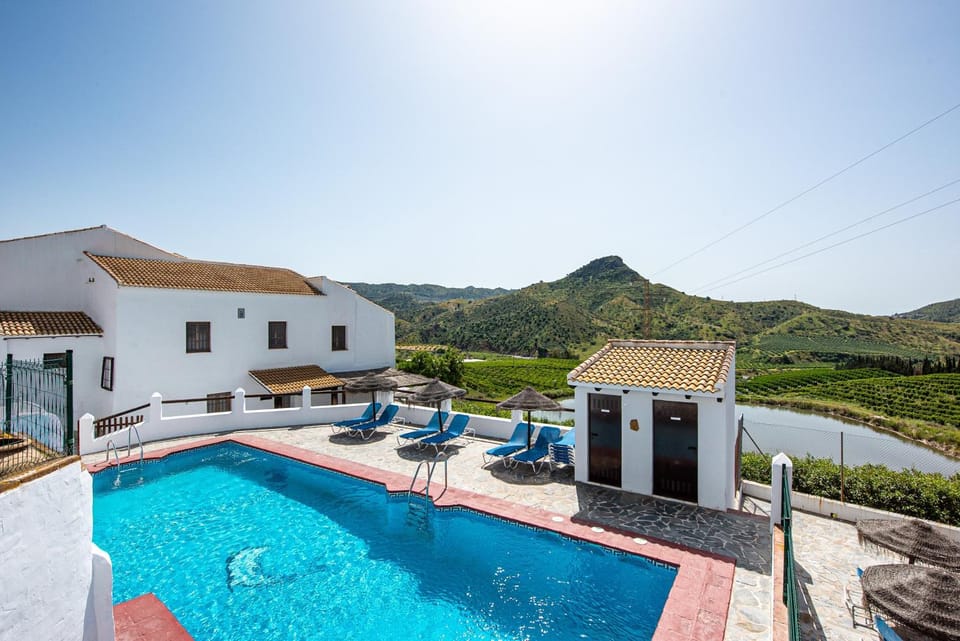 Property building, Living room, Swimming pool