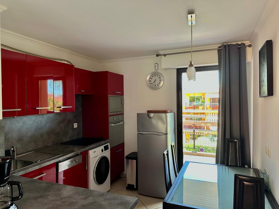 Kitchen or kitchenette, Living room, Dining area, dishwasher, oven, stove, washing machine, air conditioner