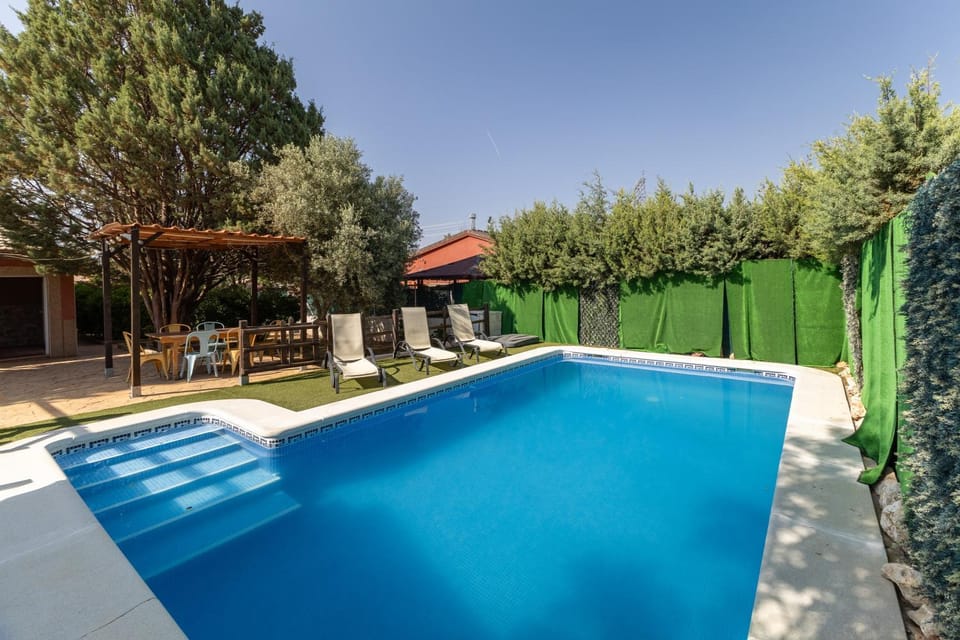 Property building, Living room, Swimming pool