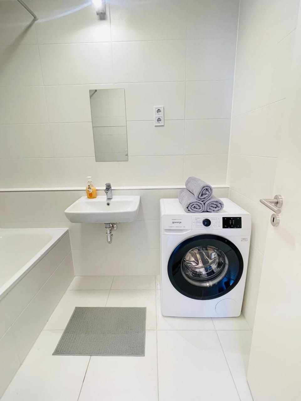 Bathroom, towels, washing machine, dryer