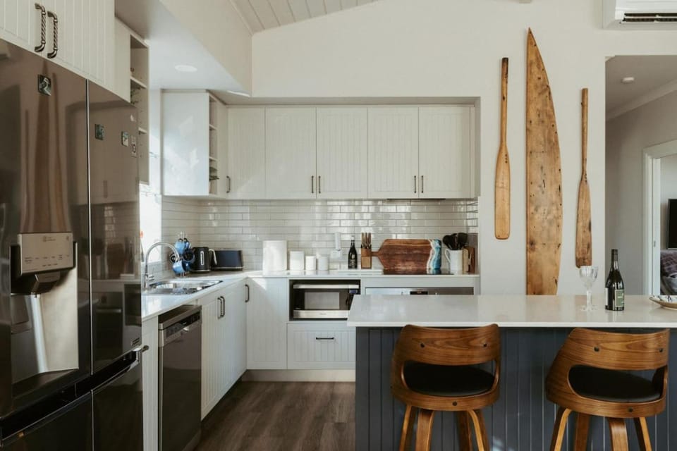 Kitchen or kitchenette, dishwasher, oven, stove, toaster