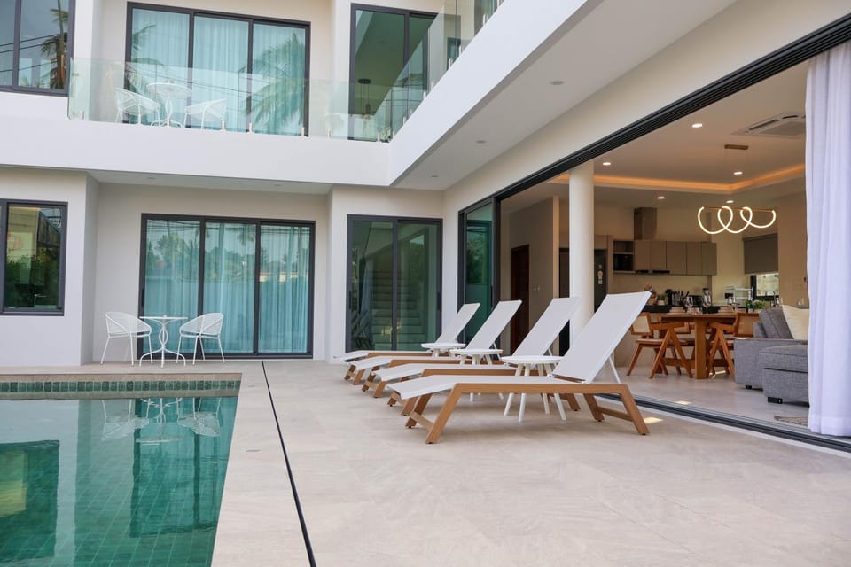 Patio, Living room, Seating area, Pool view, Swimming pool, sunbed