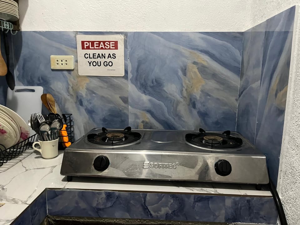 Kitchen or kitchenette, stove