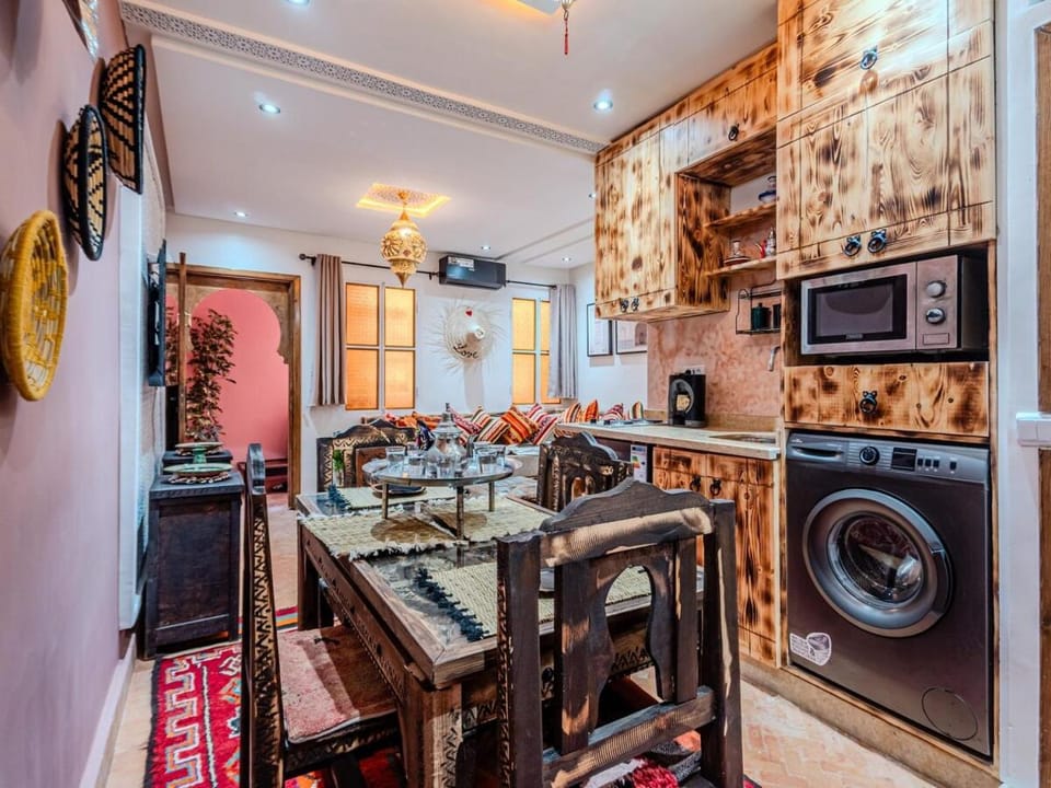 Kitchen or kitchenette, Living room, Seating area, Dining area, oven, stove, washing machine, air conditioner