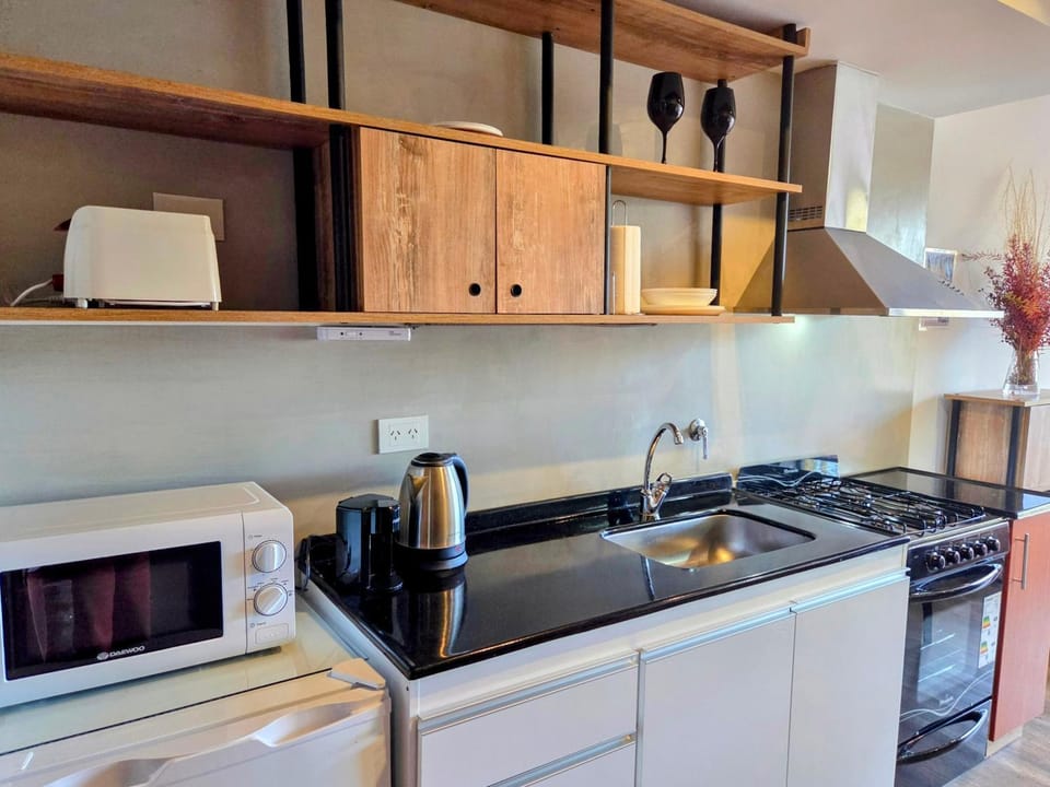 Kitchen or kitchenette, stove, toaster