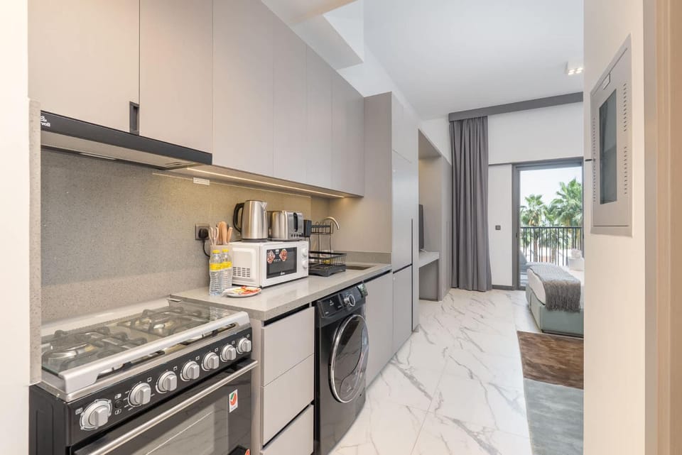 Free housekeeping visits during your stay - StayShort - Modern and Stunning Studio in MAG 910 MBR City Apartment in Dubai