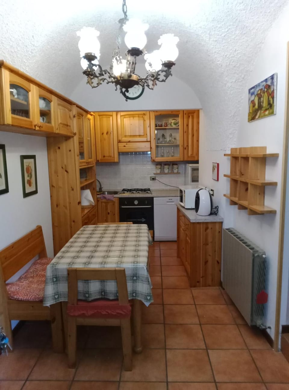 Kitchen or kitchenette, dishwasher, microwave, oven, stove